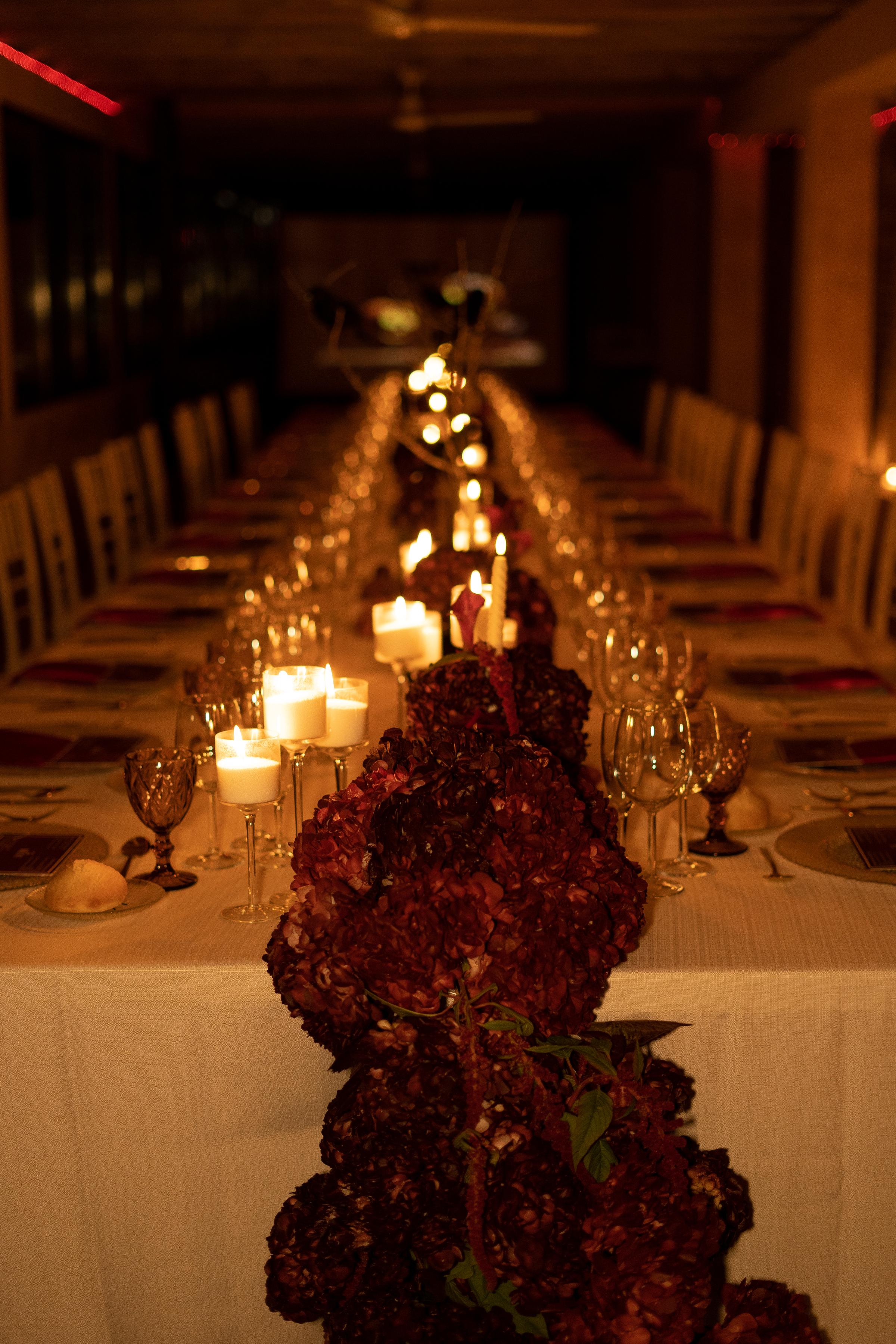 Candlelit table with a floral runner